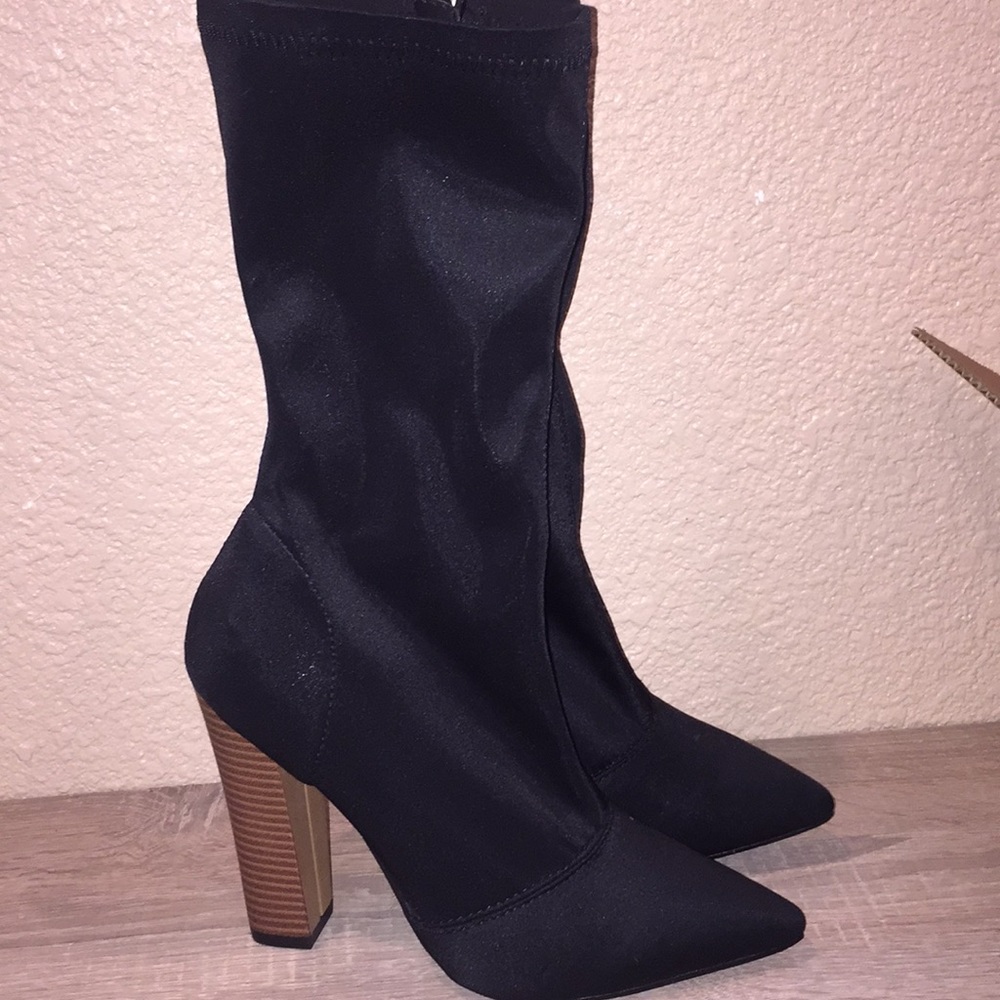 Black pointy her boots